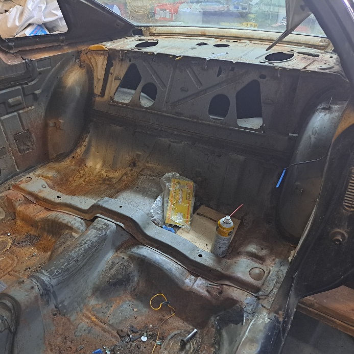 Interior stripped out- backseat view